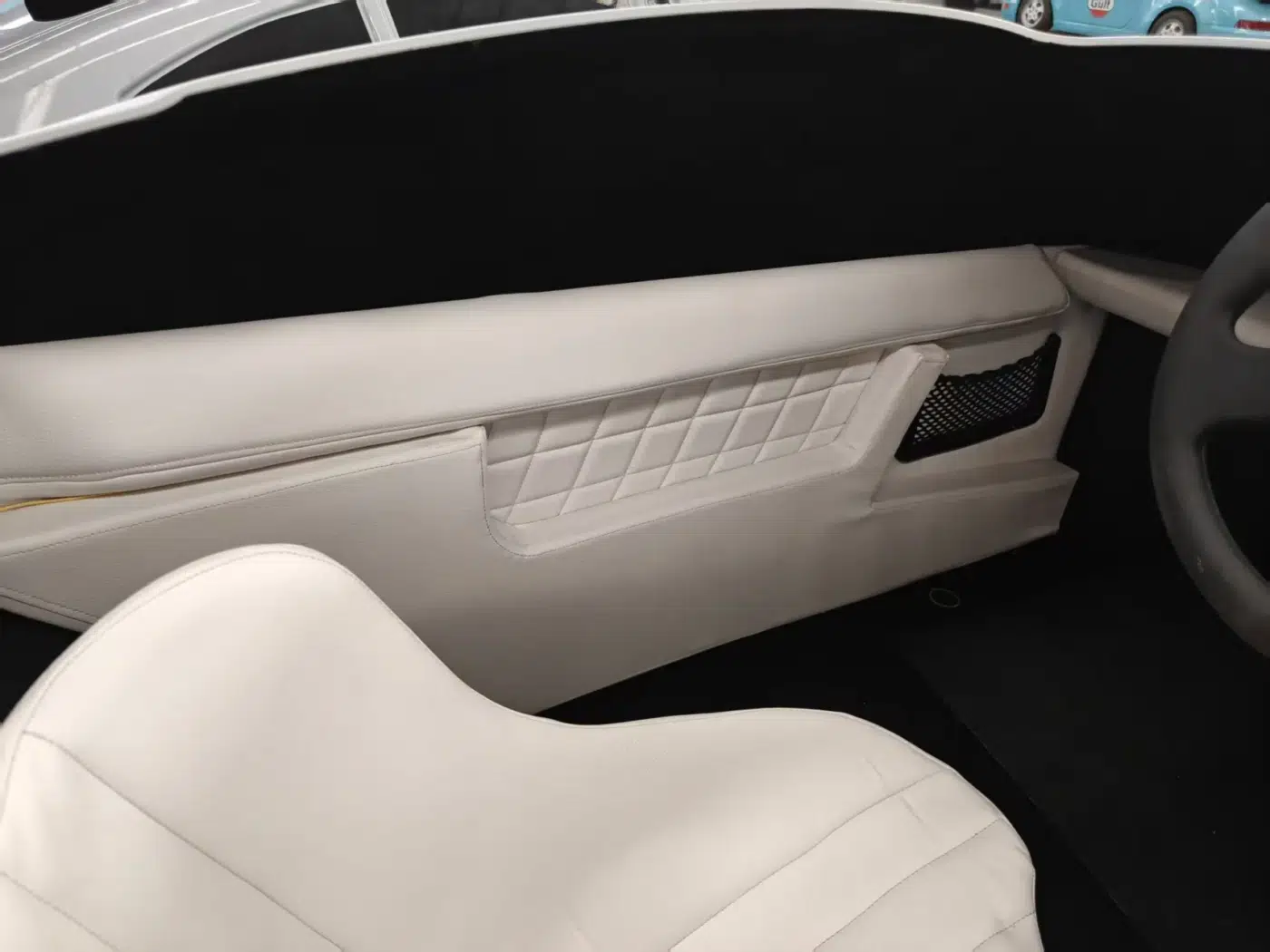 White leather interior finish component photograph for electric go-karts; exact model compatibility to be confirmed
