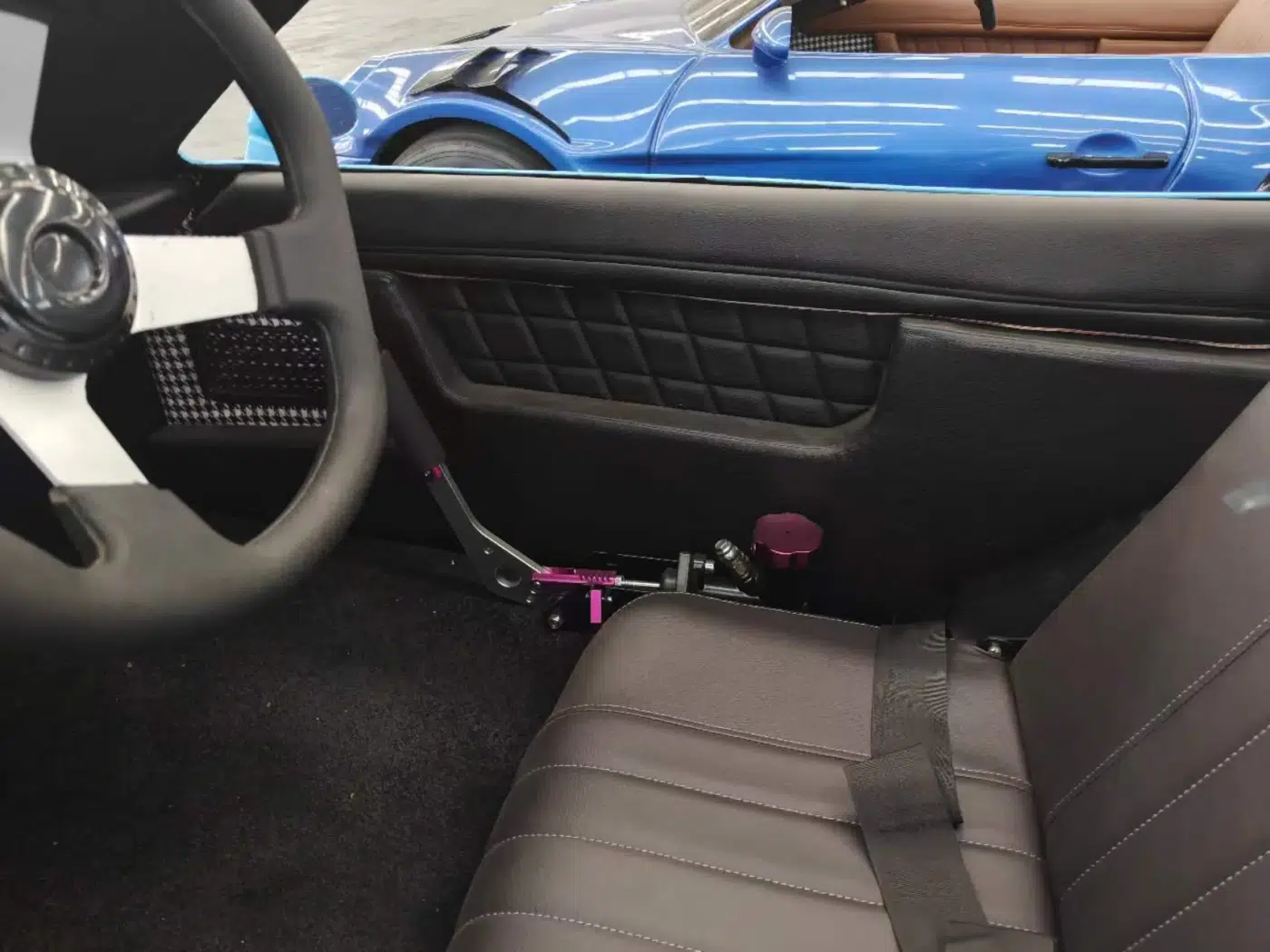 Black leather interior component photograph for electric go-karts; exact model compatibility to be confirmed