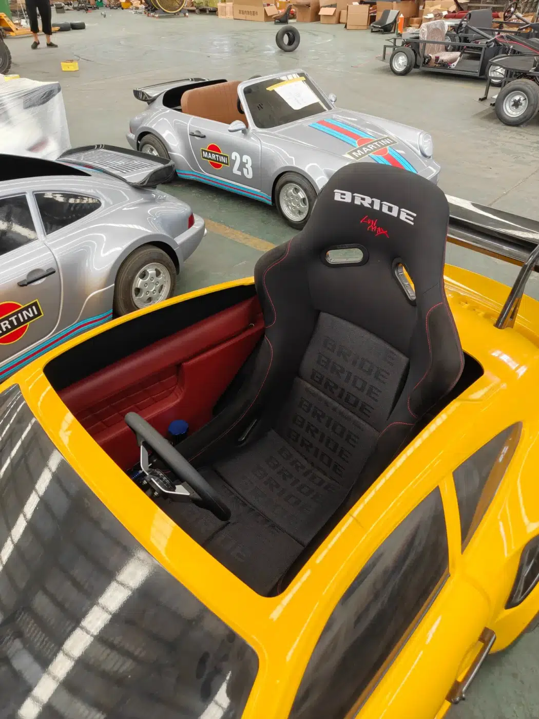 Racing seat component photograph for electric go-karts; exact model compatibility to be confirmed
